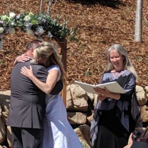 Randy & April embrace-min